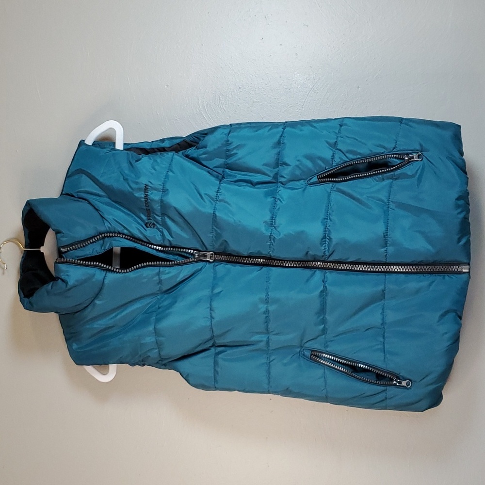 Free Country women's puffer vest. Green, size medium. Excellent condition!